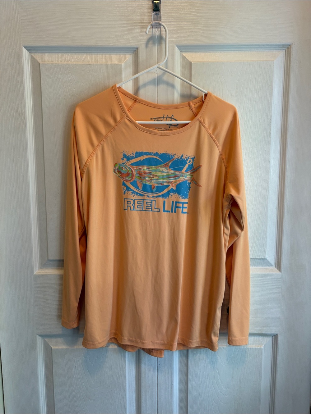Salt Life Long Sleeve Reel Life Fishing Tee in Peach with Blue Graphic